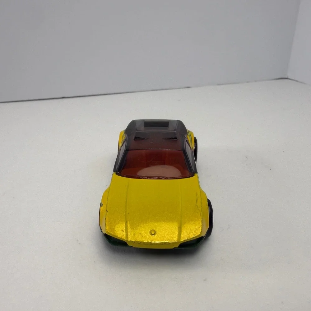 Hot Wheels La Fasta Yellow Green Taxi Service 2008 Mattel Diecast Car 1:64 Scale
